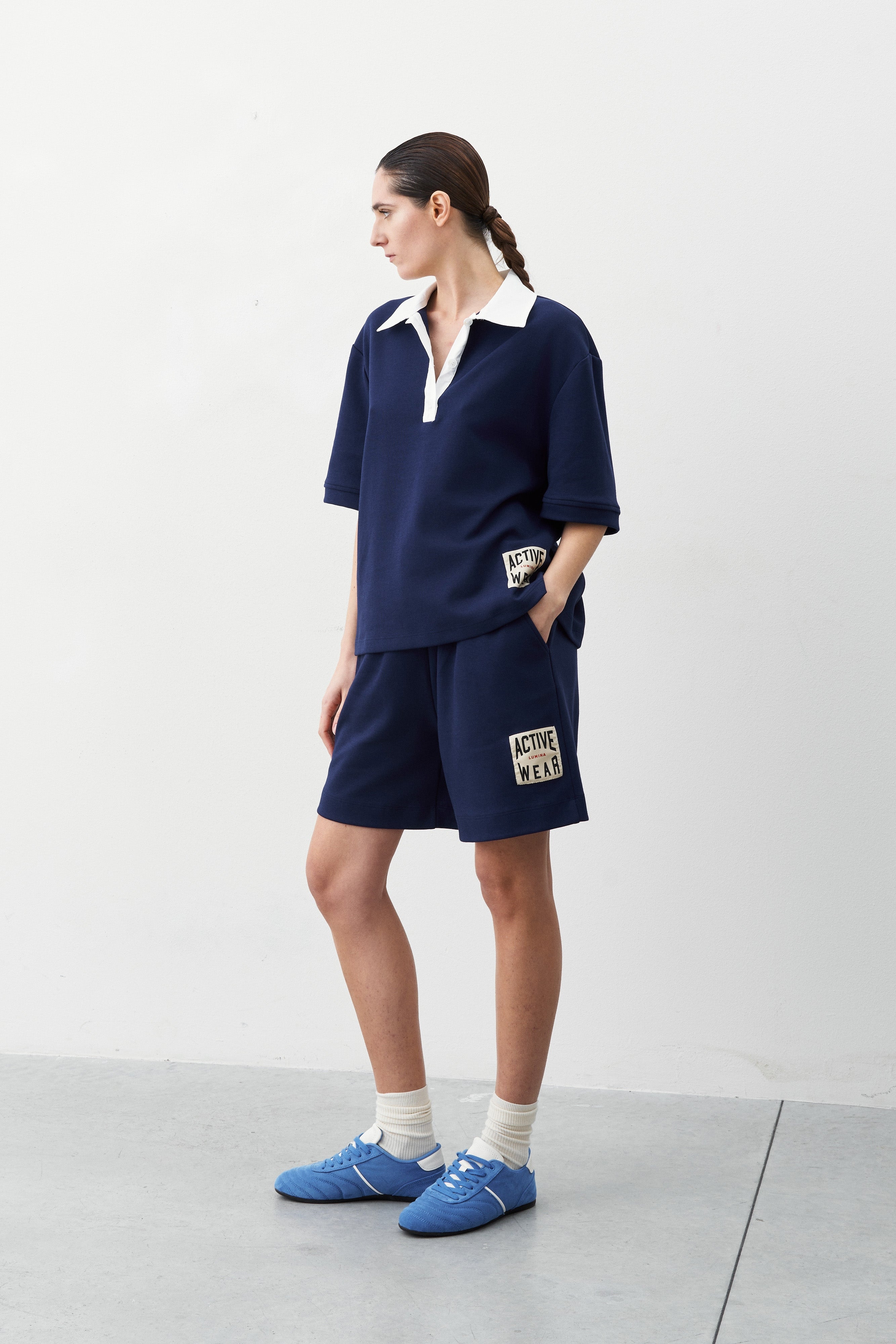 Lumina mėlyni polo marškinėliai moterims