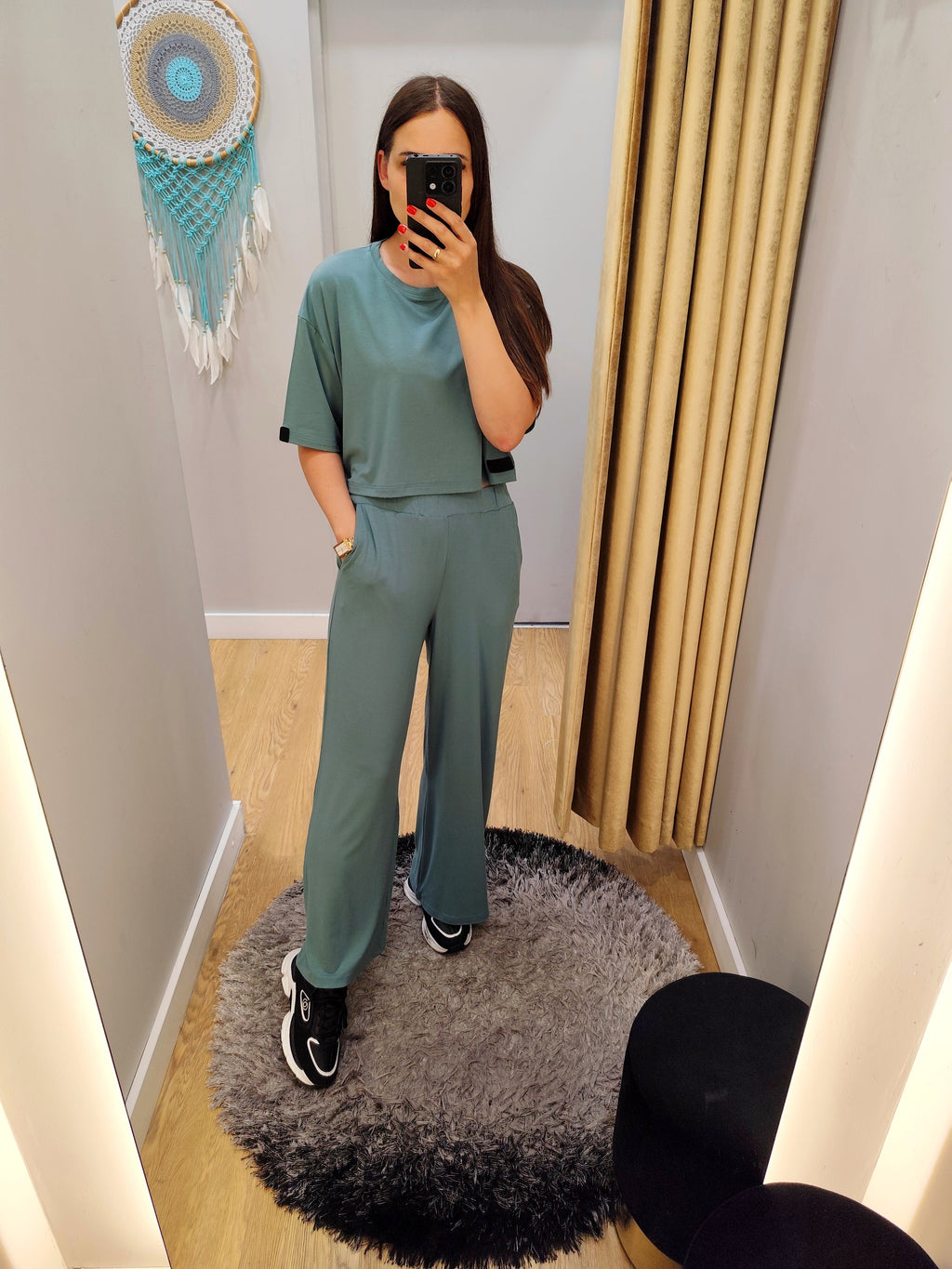 PEPPER Dusty green platėjančios kelnės moterims