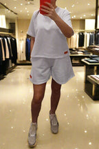 PEPPER White platėjantys šortai moterims