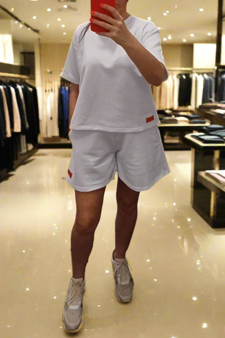 PEPPER White platėjantys šortai moterims