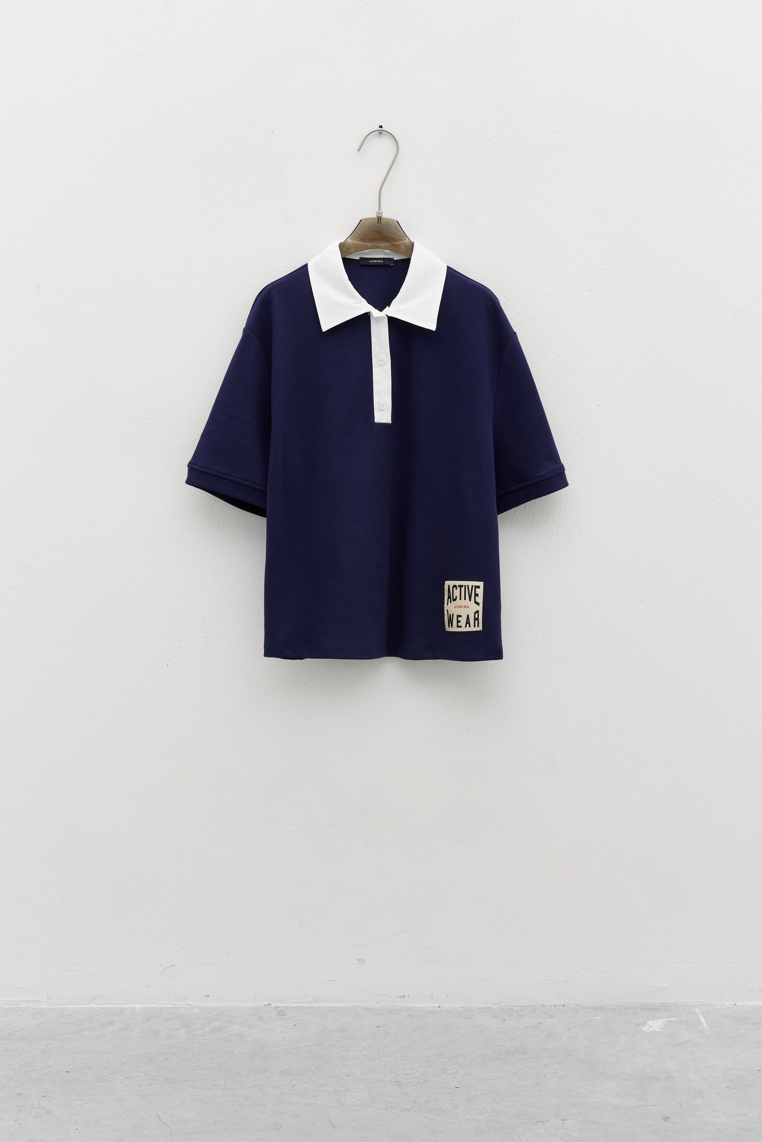 Lumina mėlyni polo marškinėliai moterims